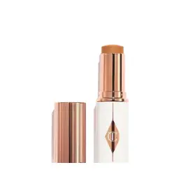 Charlotte Tilbury Unreal Skin Sheer Glow Tint Foundation Stick - 12 TAN